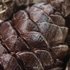 Шоколадная бомбочка в виде шишки с маршмеллоу и какао.